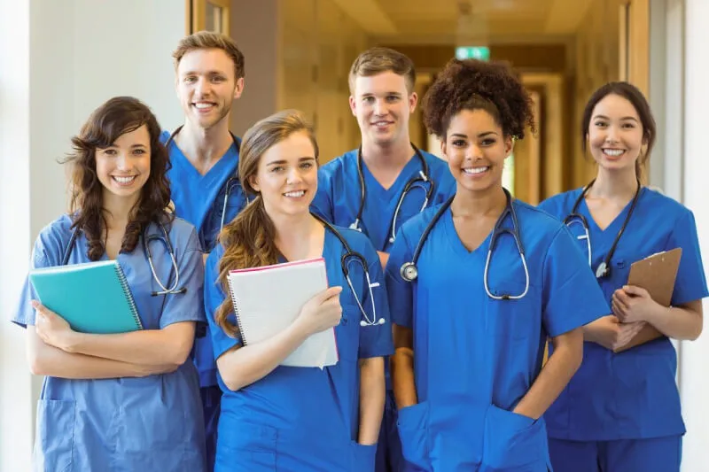 A group of nurse in blue uniform